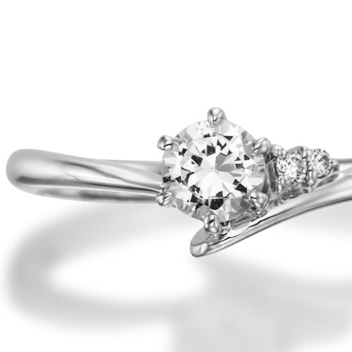 婚約指輪:指先を細く長く見せてくれる人気のV字ラインにダイヤを添えて