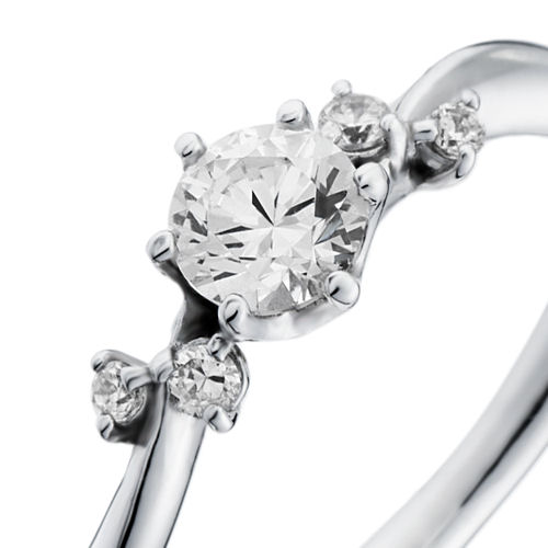 婚約指輪:柔らかな曲線を描くウェーブラインにアクセントで4石のダイヤを配したデザイン