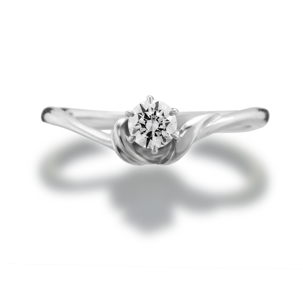 中石を包み込むようにサイドのV字ラインが印象的なソリティアリング