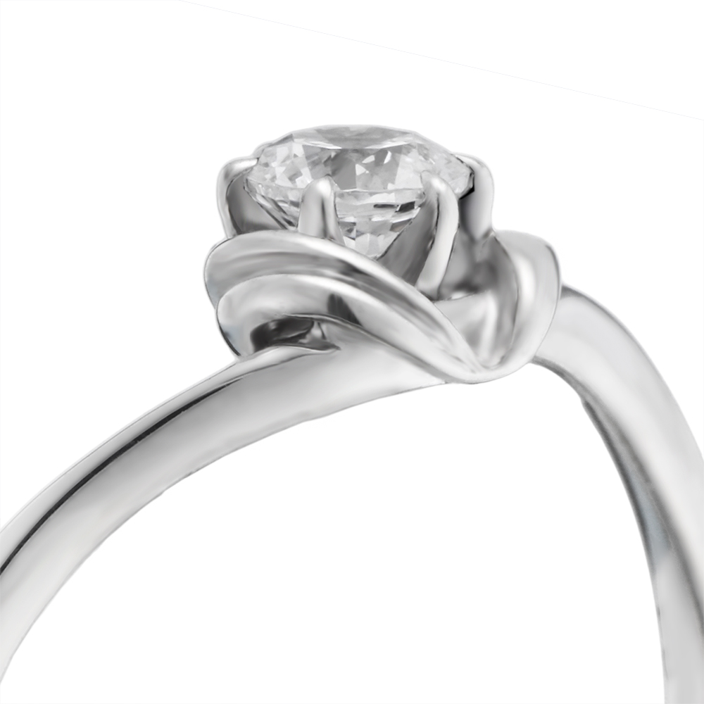 中石を包み込むようにサイドのV字ラインが印象的なソリティアリング