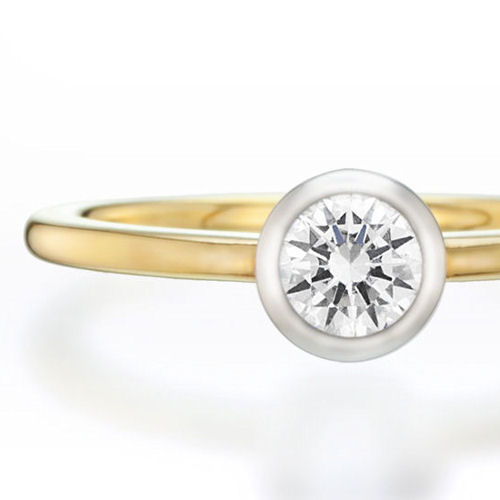 婚約指輪:ゴールドとプラチナがかわいいシンプルなフクリン留めのリング