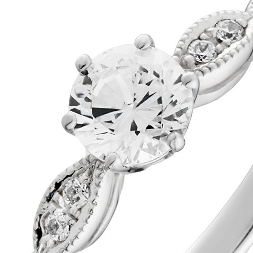 婚約指輪:お洒落にアレンジしたミル打ちのラインにダイヤモンドを添えて