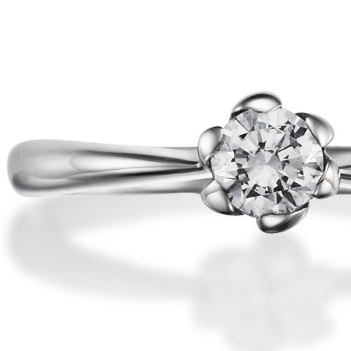 婚約指輪:指先に一輪の花が咲くシンプルで可愛らしいデザイン