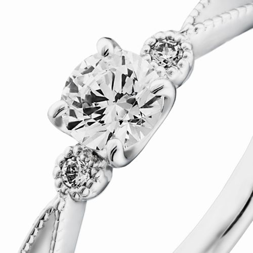 婚約指輪:中石に向かって絞ったアームにミル打ちを施した可愛らしい雰囲気のリング
